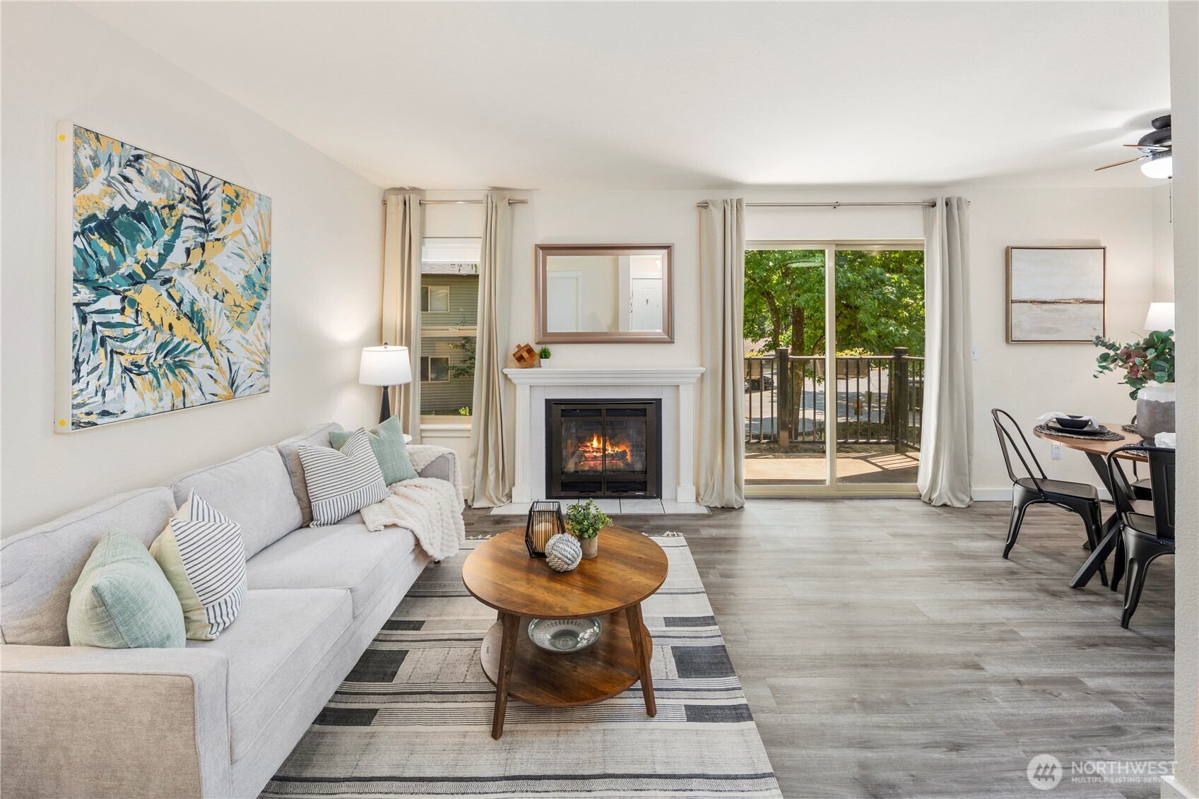 9805 Avondale Road Northeast, Unit L238 Redmond, WA 98052 - Photo 7 of 19 a living room with furniture and a fireplace