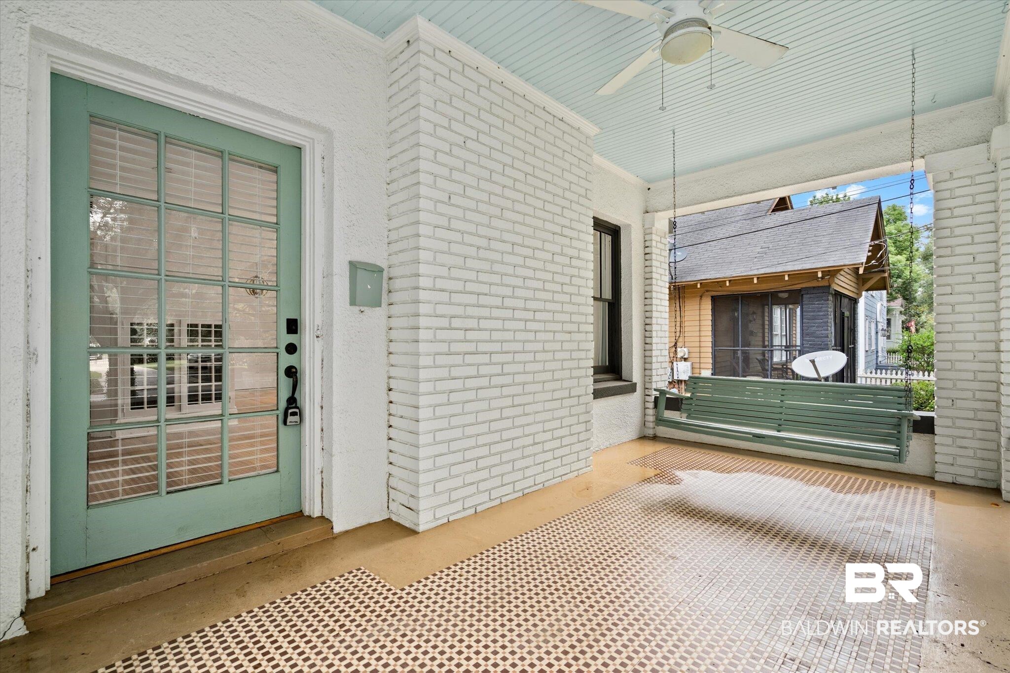 308 South Ann Street Mobile, AL 36604 - Photo 2 of 30 Unfurnished sunroom featuring ceiling fan