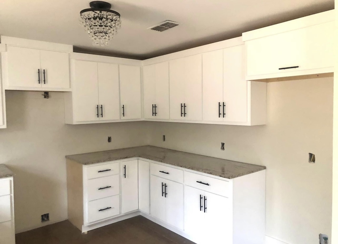 8913 Powells Chapel Road Murfreesboro, TN 37129 - Photo 5 of 15 a kitchen with granite countertop white cabinets and white appliances
