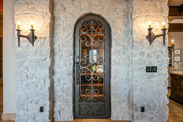 an outdoor living room with patio furniture and a potted plant