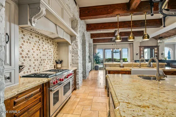 a view of a swimming pool with outdoor seating