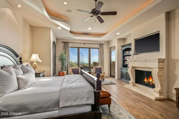 a bathroom with a granite countertop sink a mirror and vanity