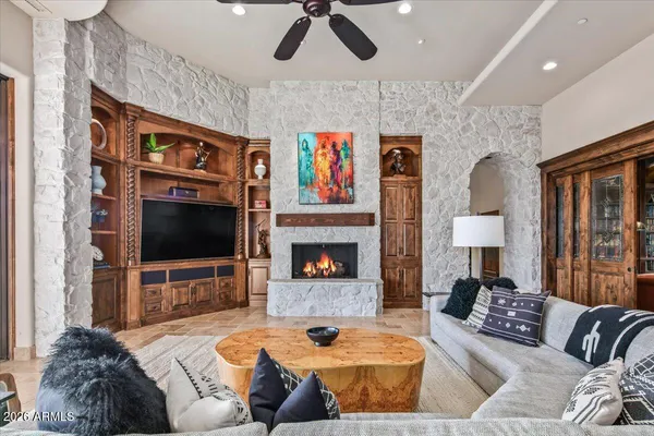 a view of a kitchen with furniture and a clock