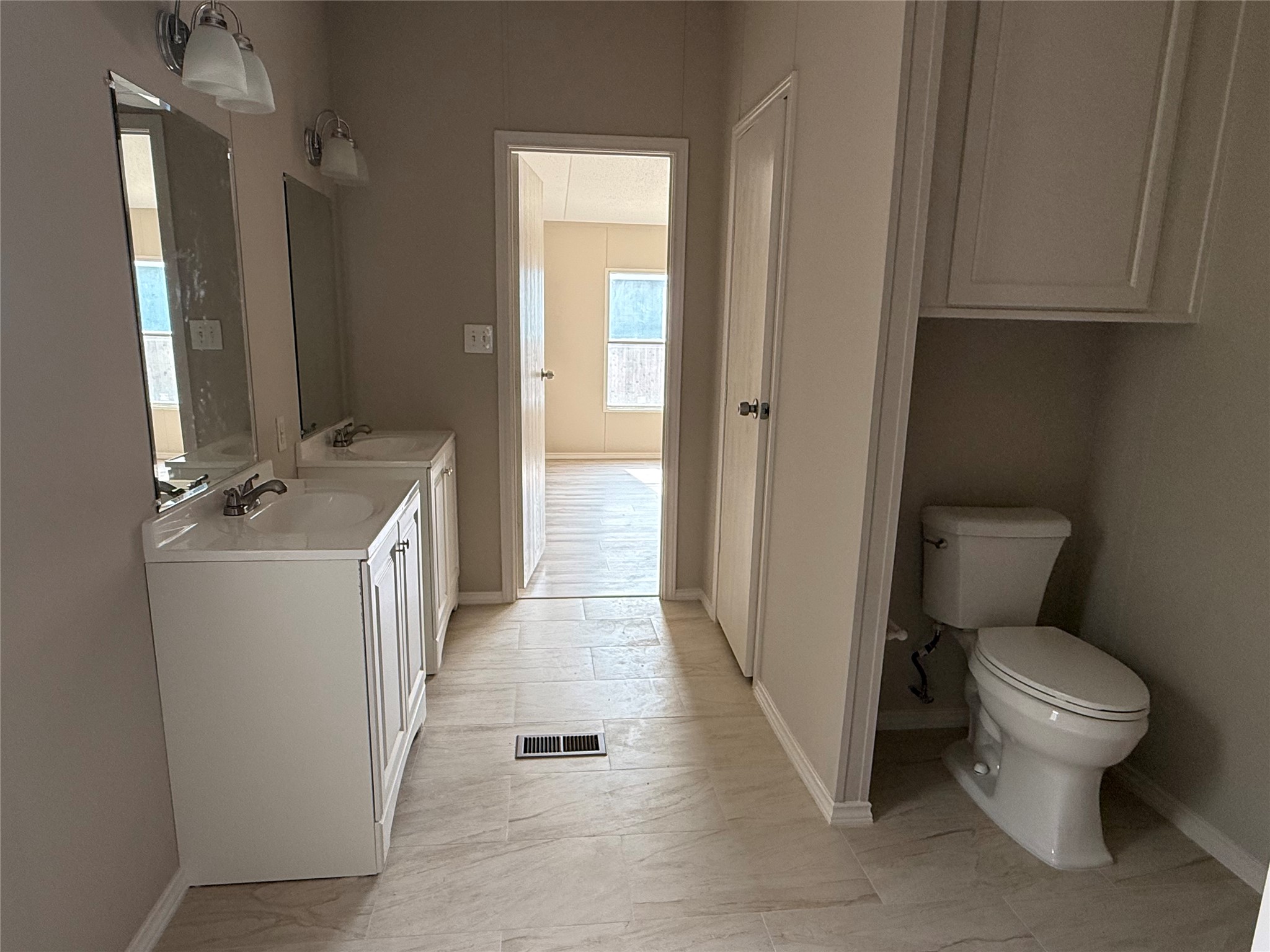 20701 Liveoak Lane Manor, TX 78653 - Photo 16 of 31 Full bath featuring toilet and double vanity