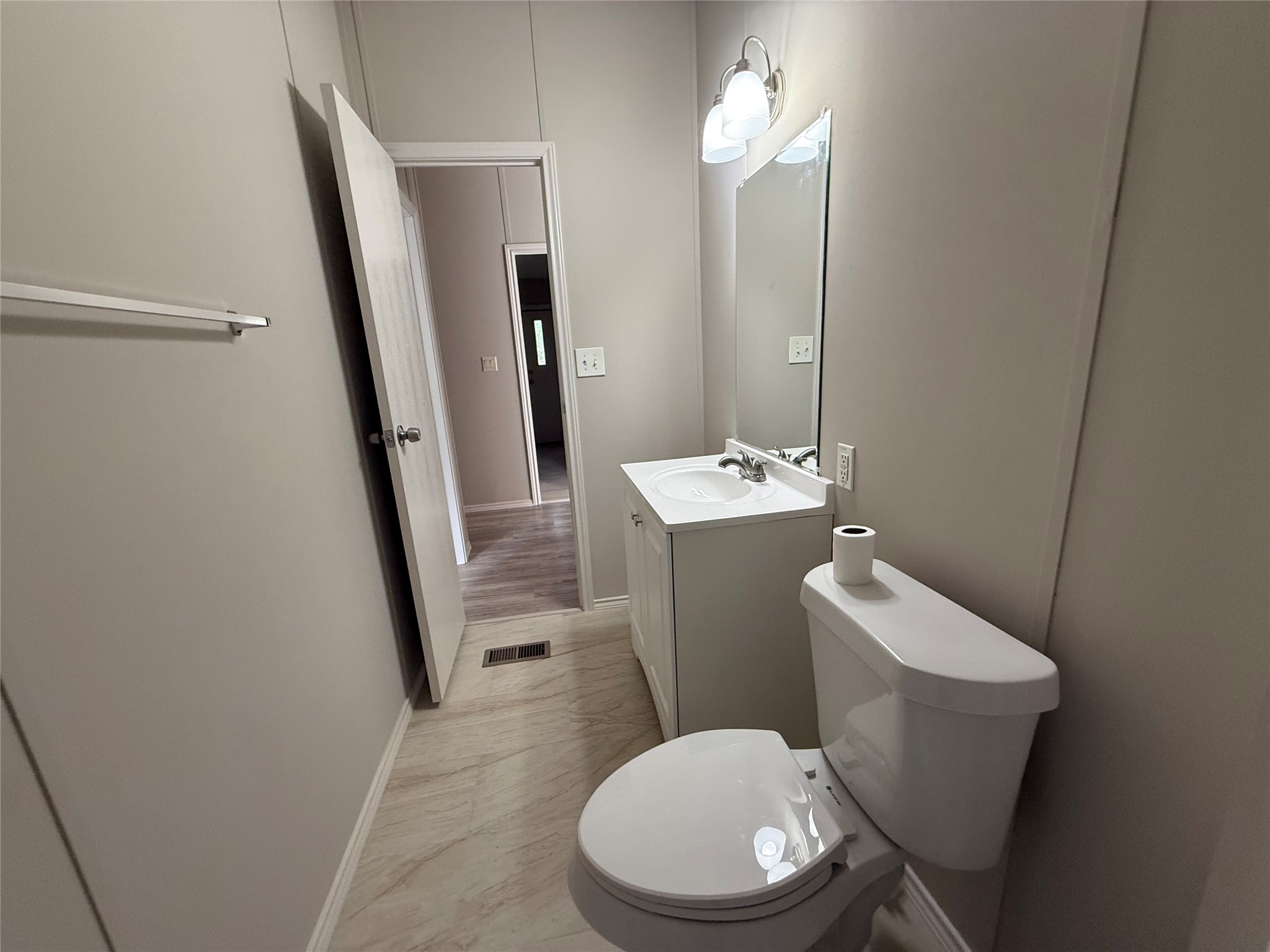 20701 Liveoak Lane Manor, TX 78653 - Photo 4 of 31 Full bath with vanity and toilet