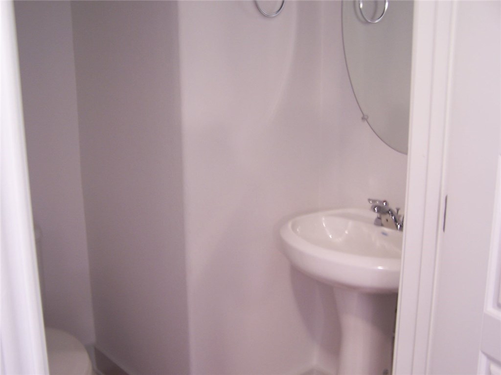 2214 Capulet Street Austin, TX 78741 - Photo 15 of 33 a bathroom with a sink