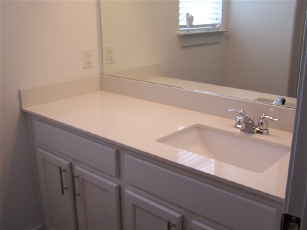 2214 Capulet Street Austin, TX 78741 - Photo 26 of 33 a close view of sink and tap