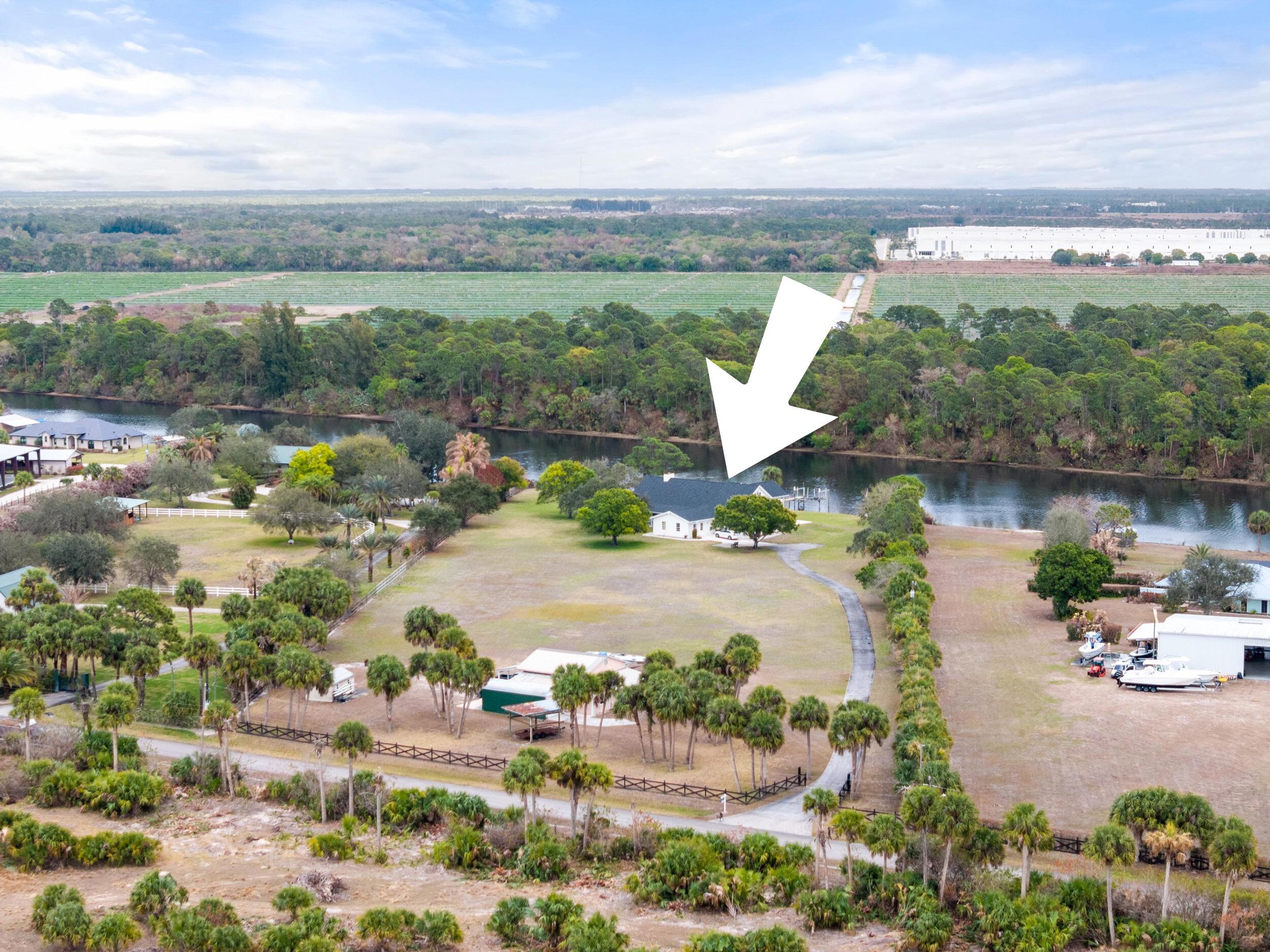 10125 Southwest Green Ridge Lane, Unit LANE Palm City, FL 34990 - Photo 62 of 87 63_dji_20260227035841_0124_d.1