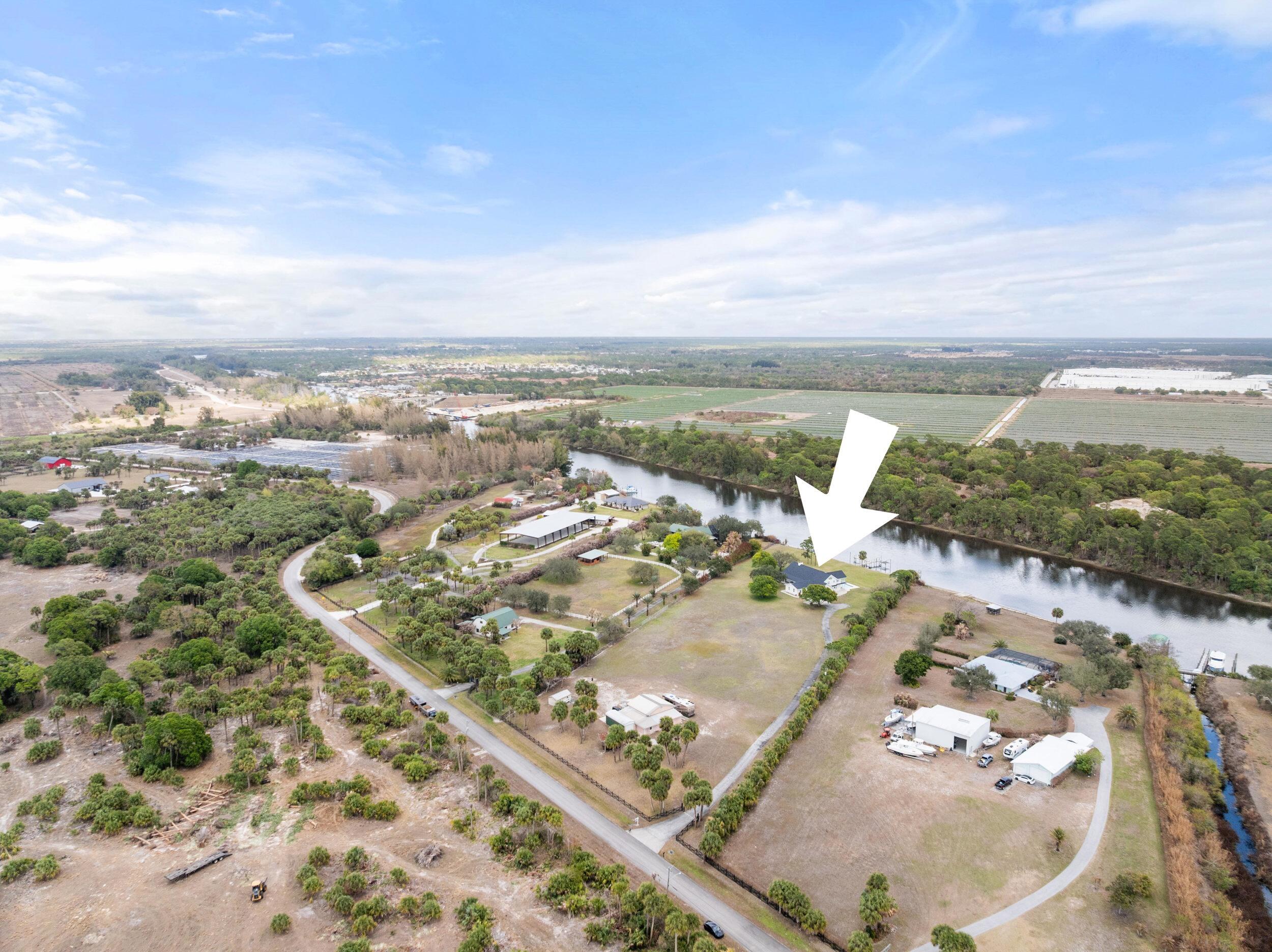 10125 Southwest Green Ridge Lane, Unit LANE Palm City, FL 34990 - Photo 63 of 87 65_dji_20260227035903_0129_d.1