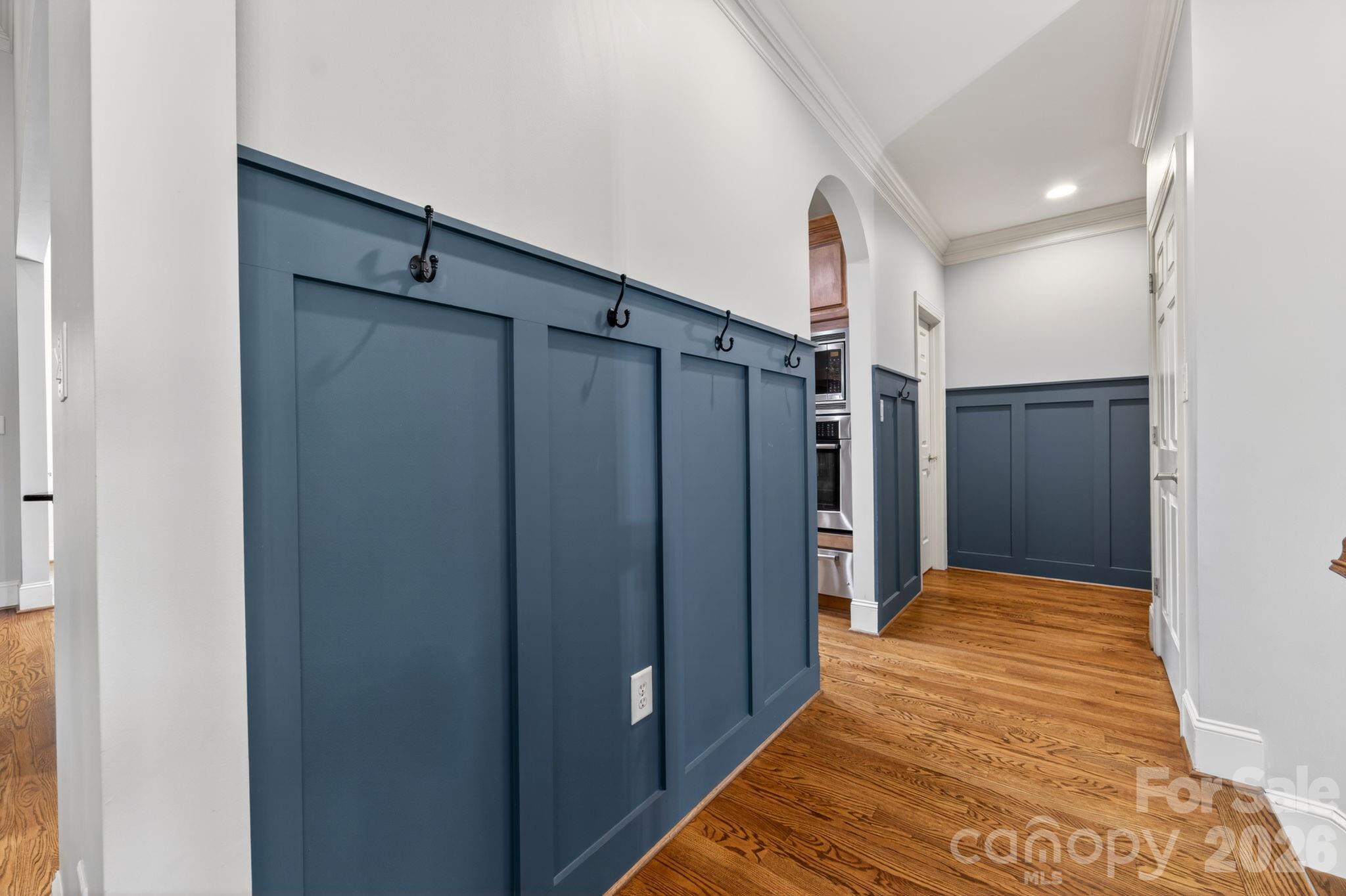 3138 Rappahannock Court, Unit 16 Matthews, NC 28104 - Photo 20 of 38 a view of hallway with wooden floor