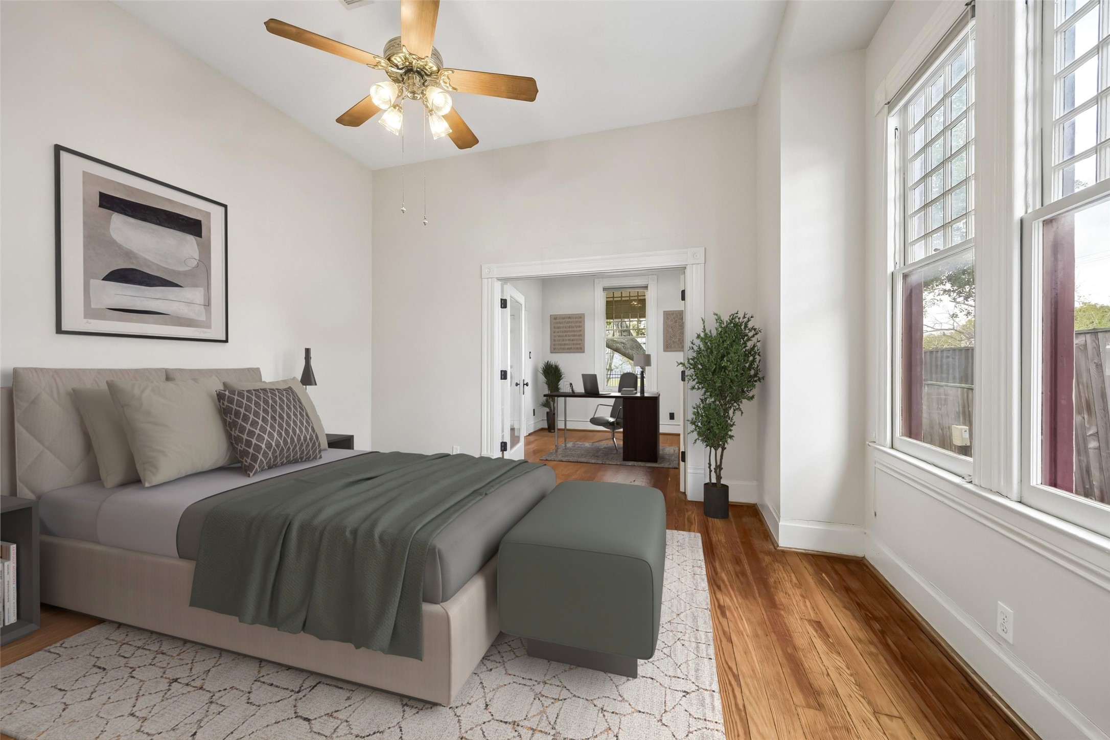 1846 Arlington Street Houston, TX 77008 - Photo 19 of 41 a living room with a bed furniture and a large window