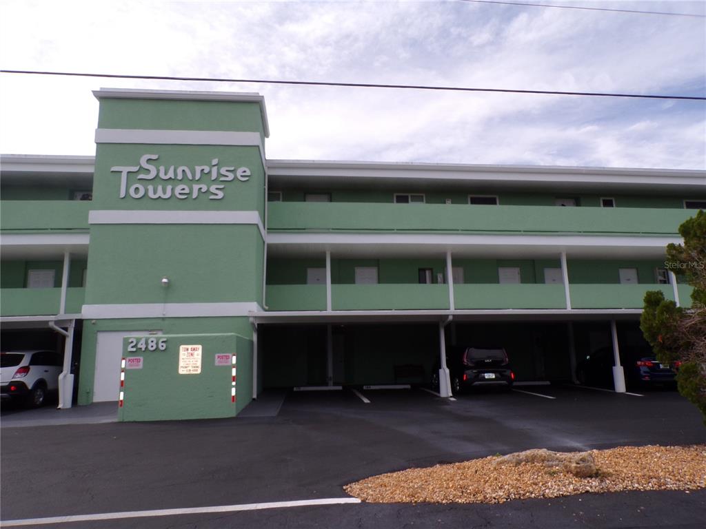 a front view of a building with yard