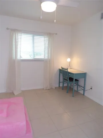 a room with furniture and window