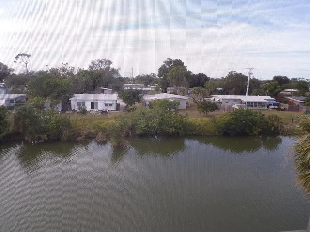 a view of a lake with houses