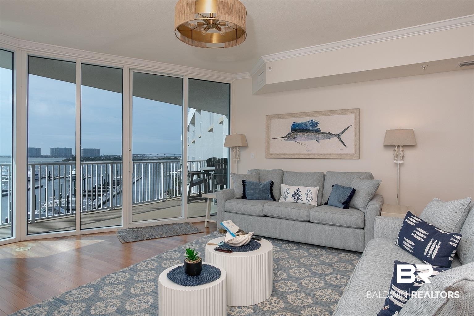 27800 Canal Road, Unit 411 Orange Beach, AL 36561 - Photo 5 of 49 Living area featuring expansive glass sliding doors opening to a private balcony