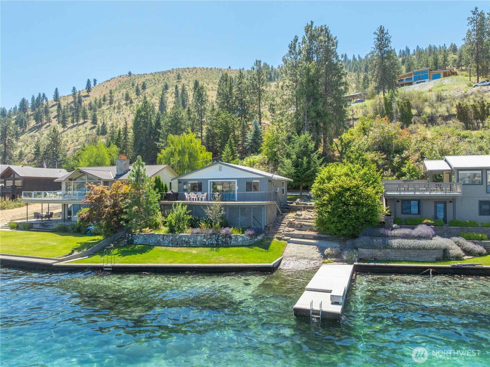 3132 South Lakeshore Road Chelan, WA 98816 - Photo 34 of 36 an aerial view of a house with swimming pool and big yard