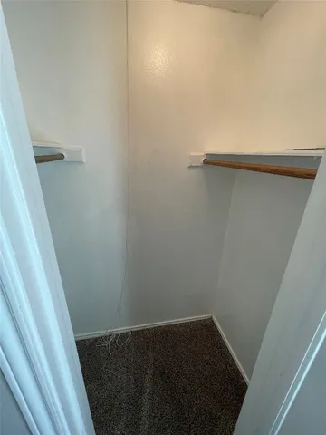 a bathroom with a sink vanity and mirror