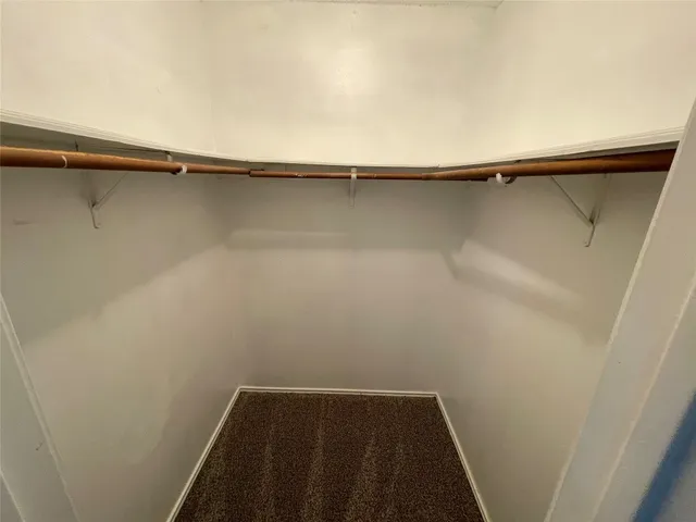 a bathroom with a sink mirror toilet and bathtub