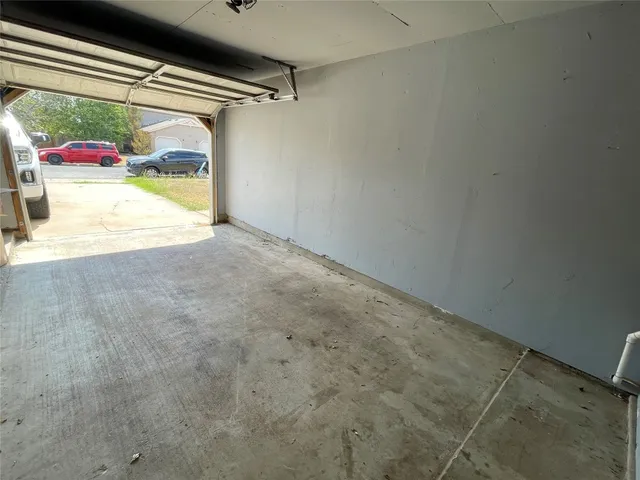 a view of garage and utility room