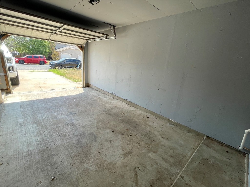 8810 Springmail Circle, Unit B Austin, TX 78729 - Photo 23 of 26 a view of a garage