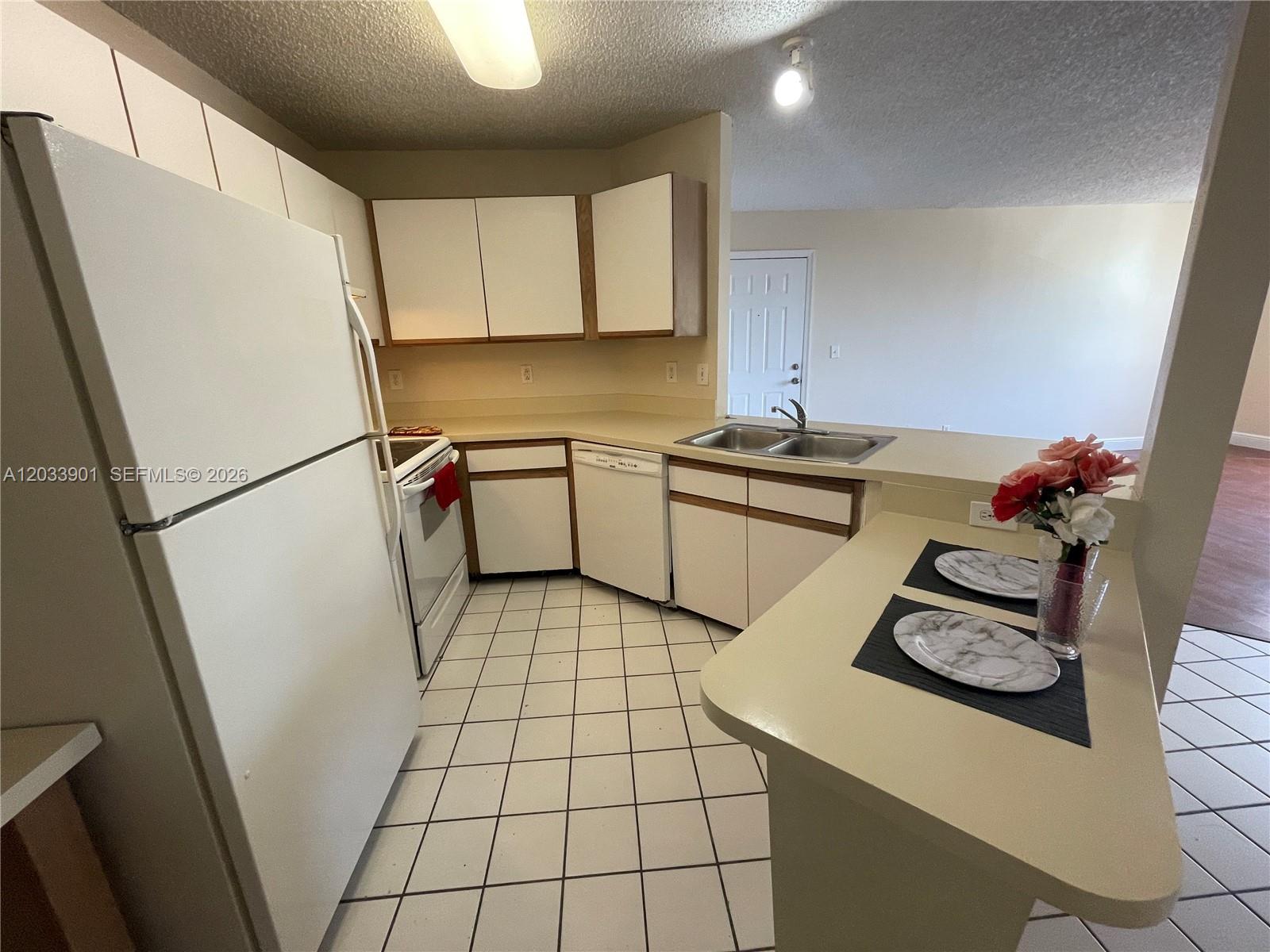 4015 West McNab Road, Unit D212 Pompano Beach, FL 33069 - Photo 1 of 20