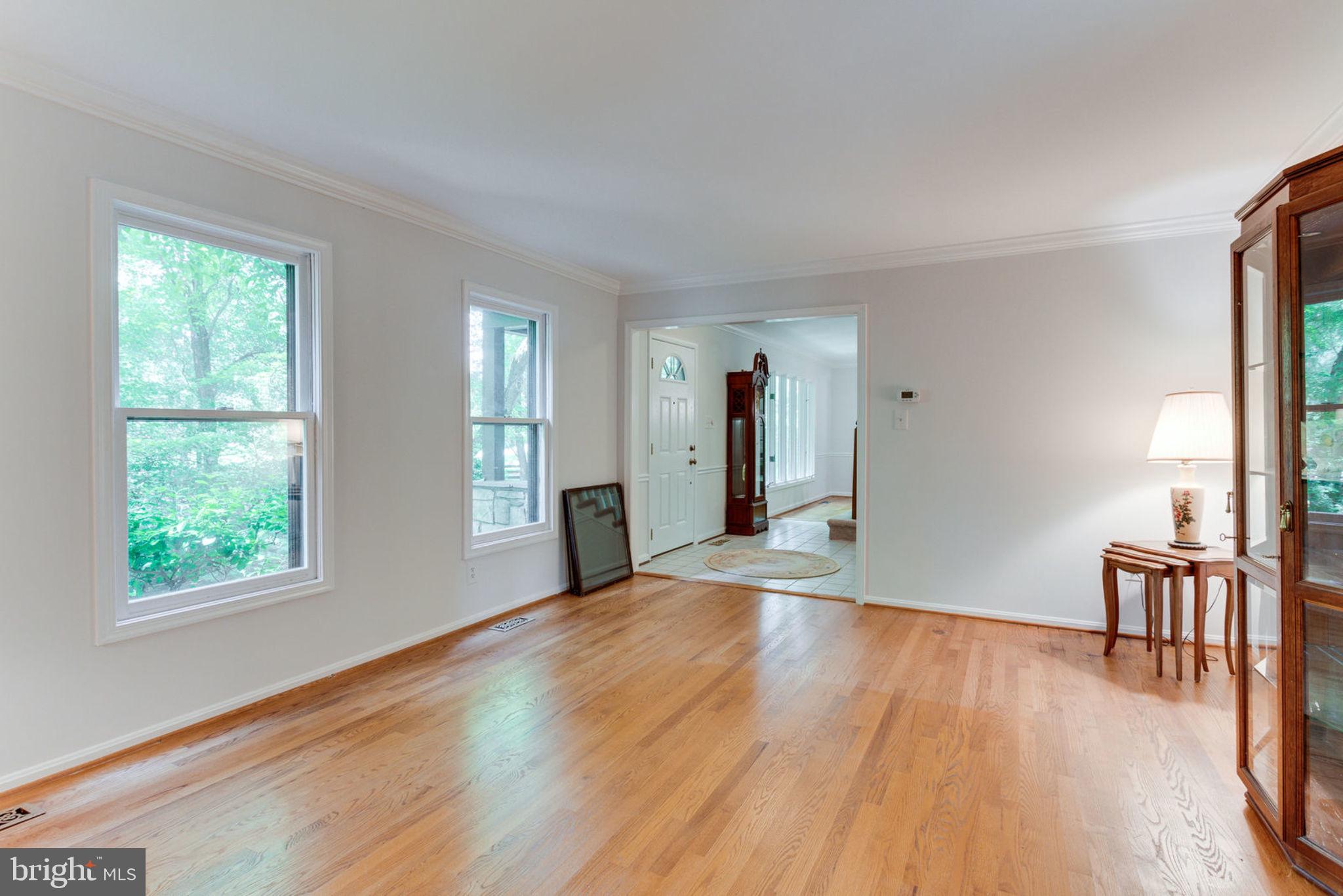 10104 Lawyers Road Vienna, VA 22181 - Photo 14 of 46 The formal living room with hardwood floors