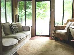401 North Boren Street Springfield, TN 37172 - Photo 3 of 13 Great front entrance sunroom w/lots of natural light and brick floors.