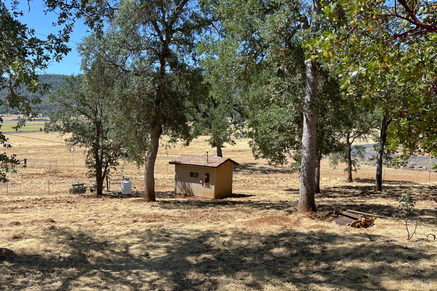 17277 Butts Canyon Road Middletown, CA 95461 - Photo 33 of 41 a view of a yard with wooden fence