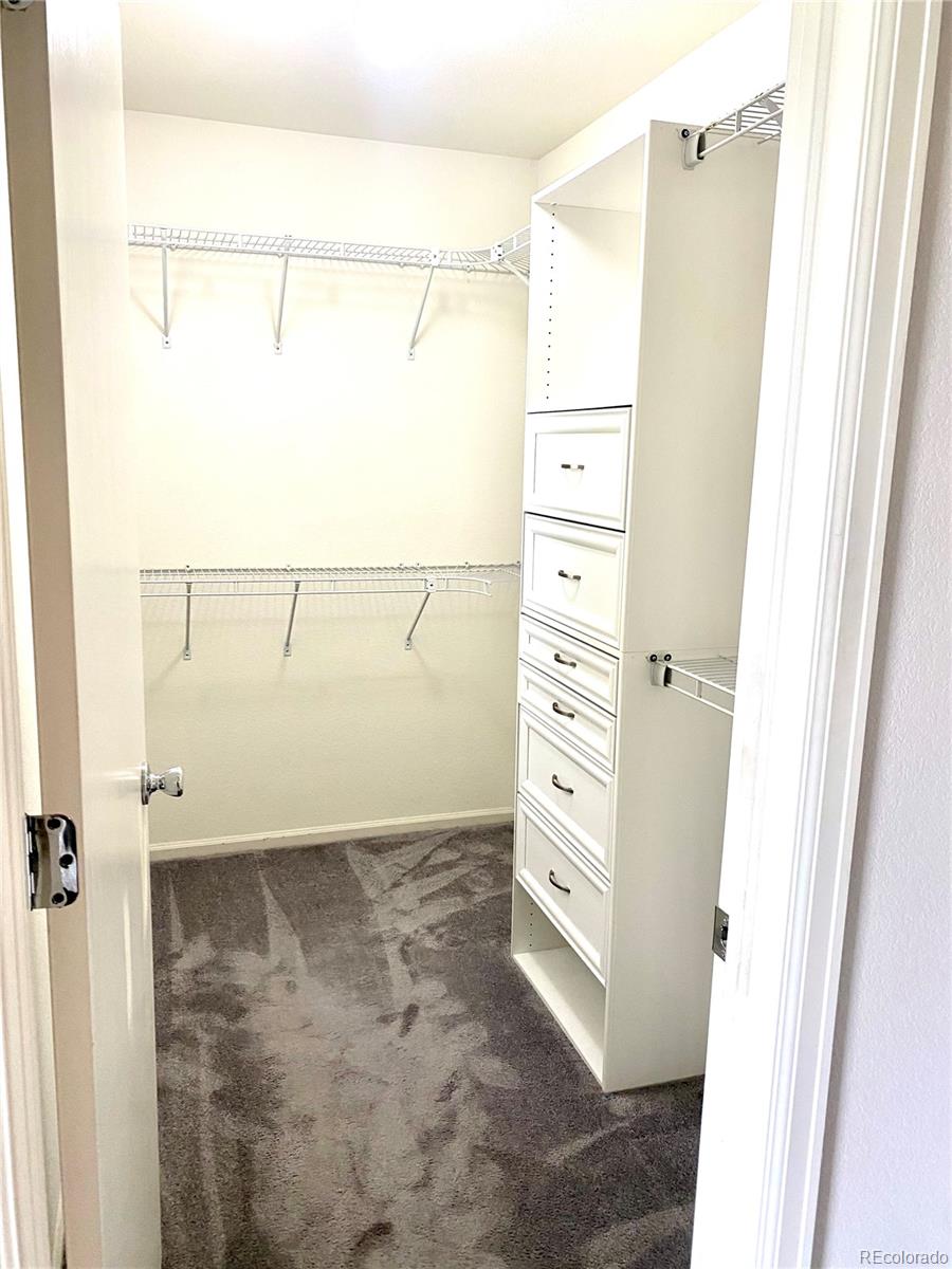 2011 Uinta Street Denver, CO 80238 - Photo 18 of 28 a view of walk in closet
