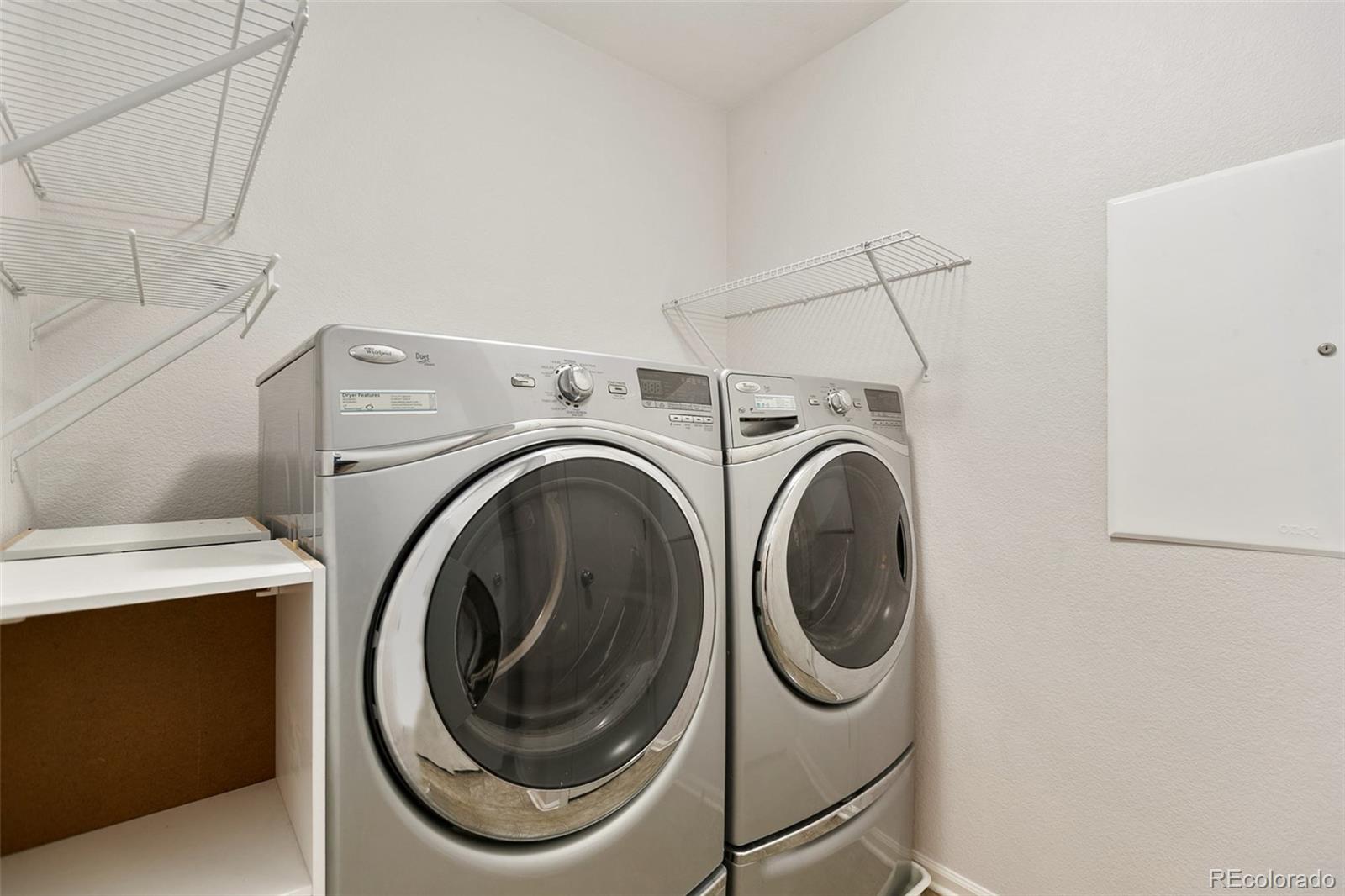 2011 Uinta Street Denver, CO 80238 - Photo 24 of 28 a utility room with dryer and washer