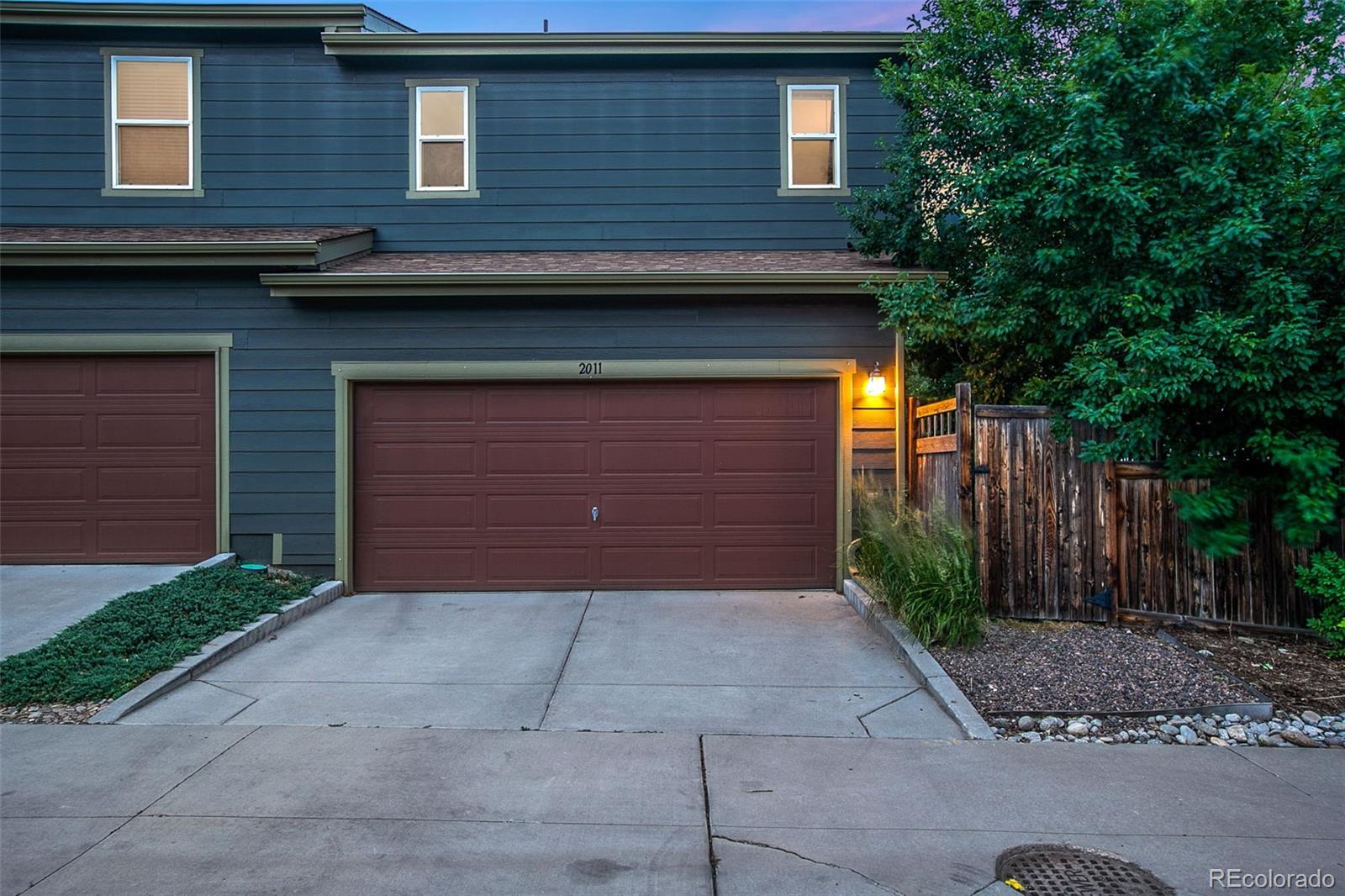 2011 Uinta Street Denver, CO 80238 - Photo 5 of 28 a front view of a house with garage