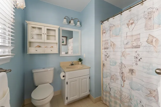 a large brick building with a table and chairs