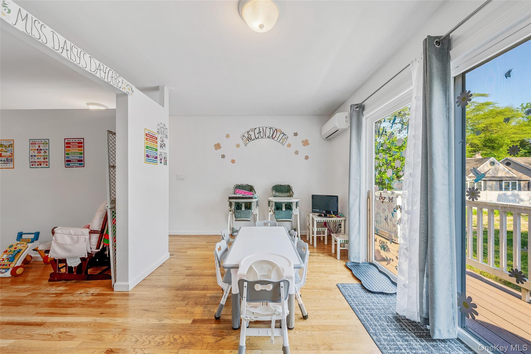 80 George Street Babylon, NY 11702 - Photo 24 of 41 a living room with furniture and a table