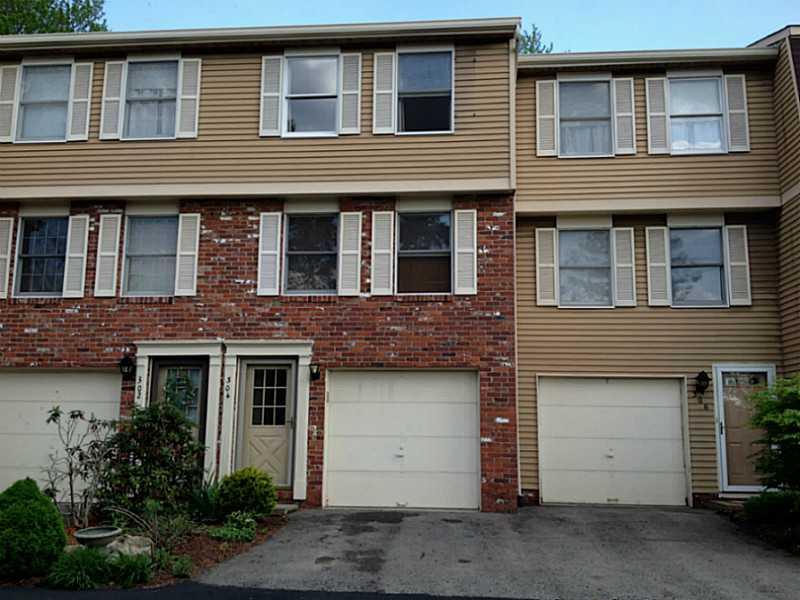 Exterior Front. Level entry townhouse in the desirable community of Quail Run.