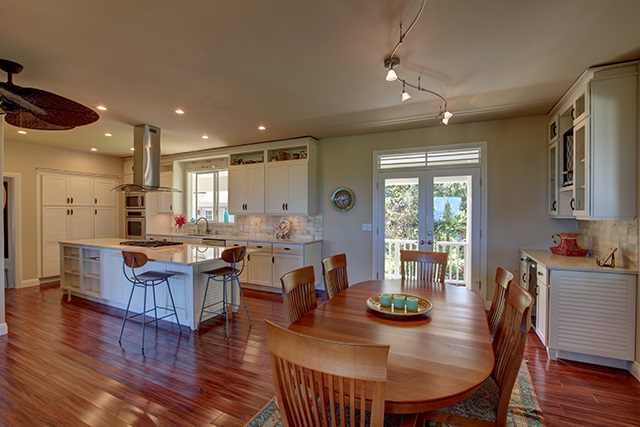 500 North Holokai Place Haiku, HI 96708 - Photo 3 of 17 a view of a dining room with furniture window and wooden floor