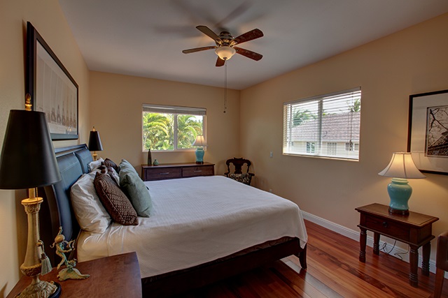 500 North Holokai Place Haiku, HI 96708 - Photo 9 of 17 a bed room with a bed and a window