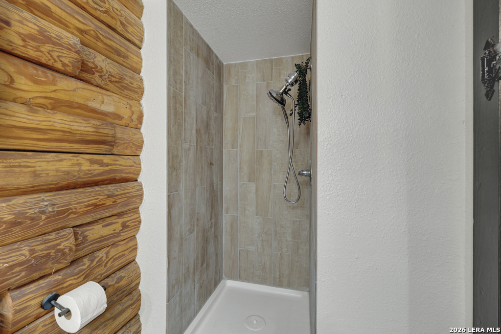 3165 Vivroux Ranch Road Seguin, TX 78155 - Photo 26 of 50 a bathroom with a shower