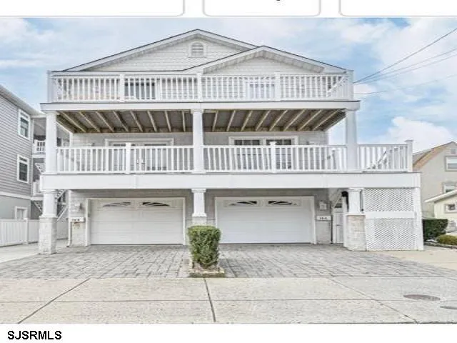 a view of a balcony with wooden floor