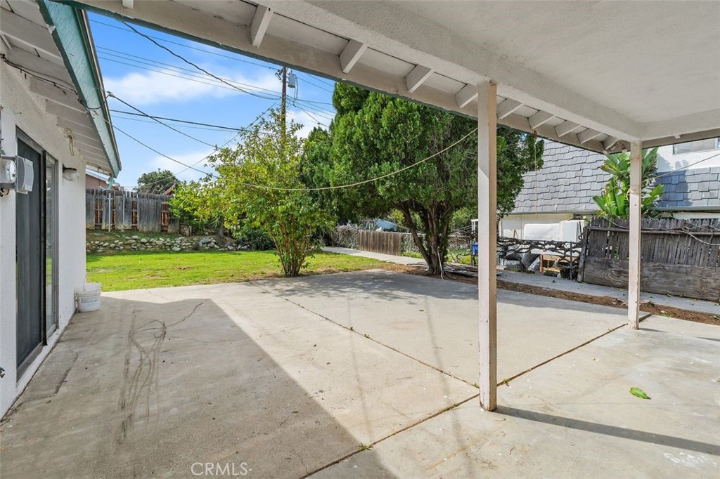786 Spruce Street Riverside, CA 92507 - Photo 24 of 29 a view of backyard with swimming pool