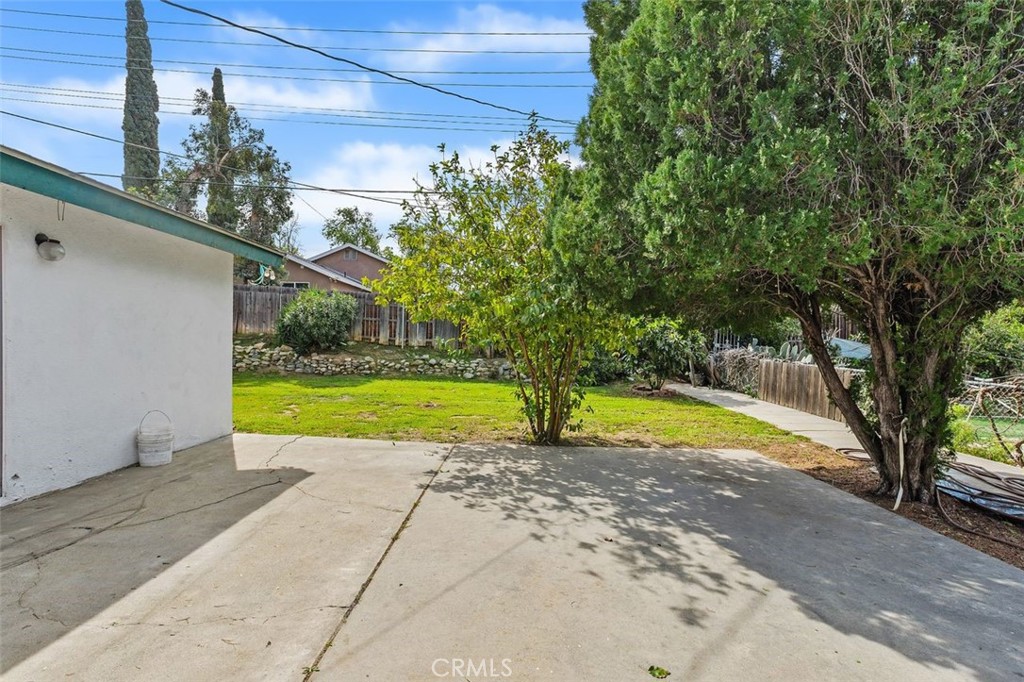 786 Spruce Street Riverside, CA 92507 - Photo 25 of 29 a view of swimming pool with a yard