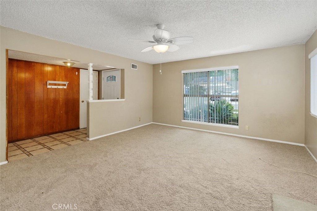 786 Spruce Street Riverside, CA 92507 - Photo 5 of 29 an empty room with windows and closet