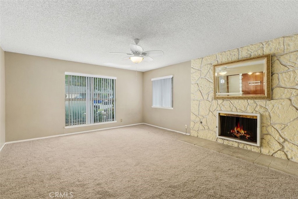 786 Spruce Street Riverside, CA 92507 - Photo 7 of 29 a view of empty room with fireplace