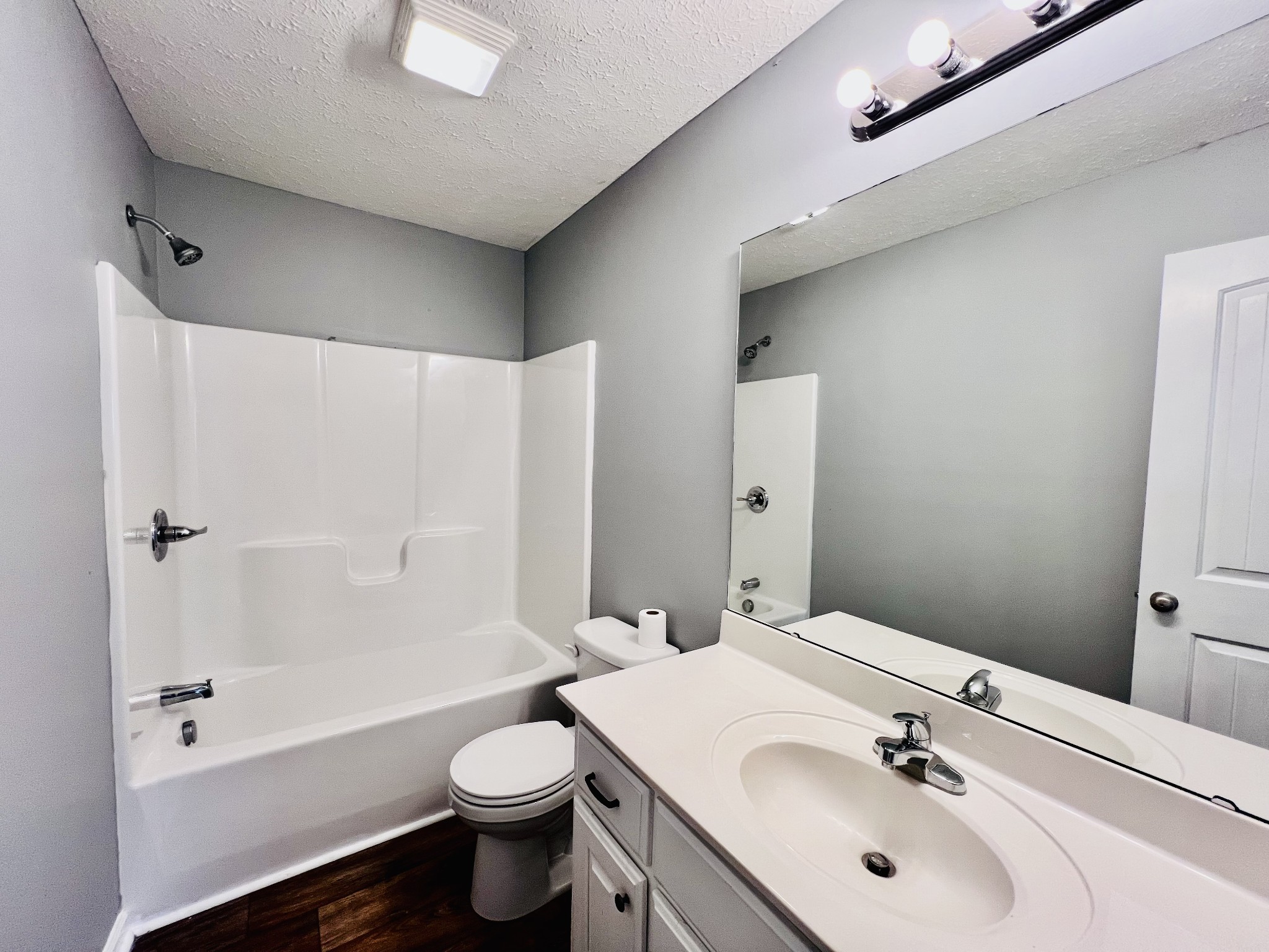 4759 Little Dry Creek Road Pulaski, TN 38478 - Photo 13 of 18 a bathroom with a sink a toilet and shower