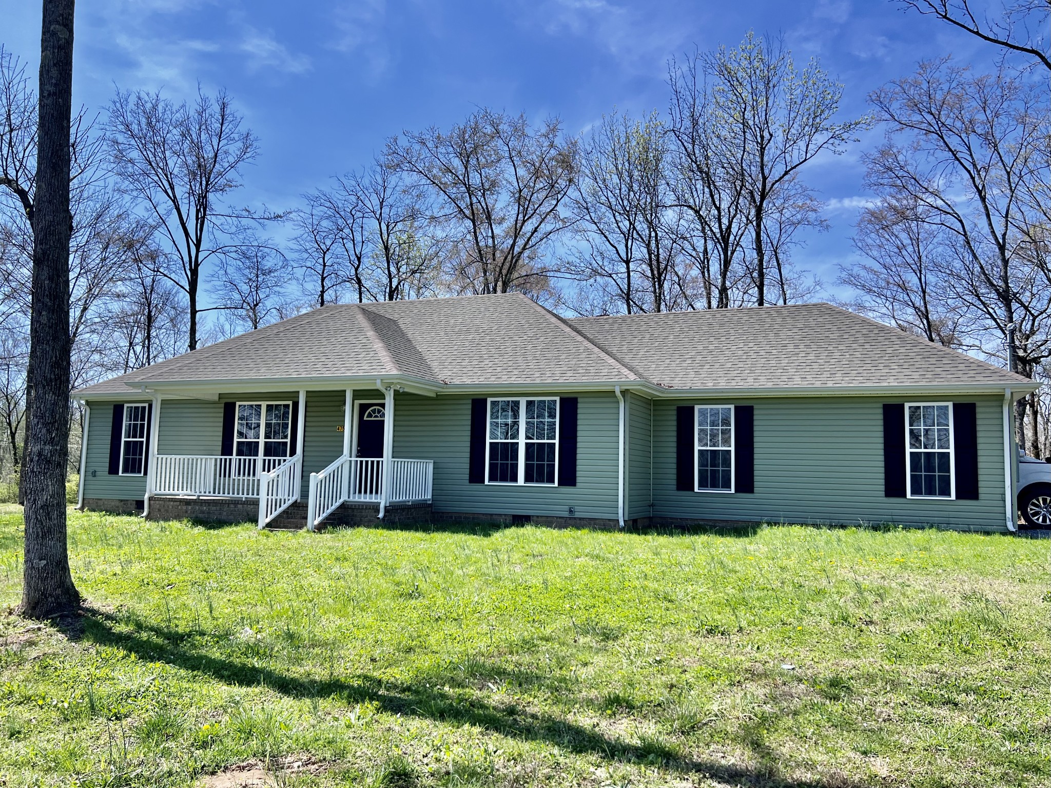 4759 Little Dry Creek Road Pulaski, TN 38478 - Photo 16 of 18 a front view of a house with garden