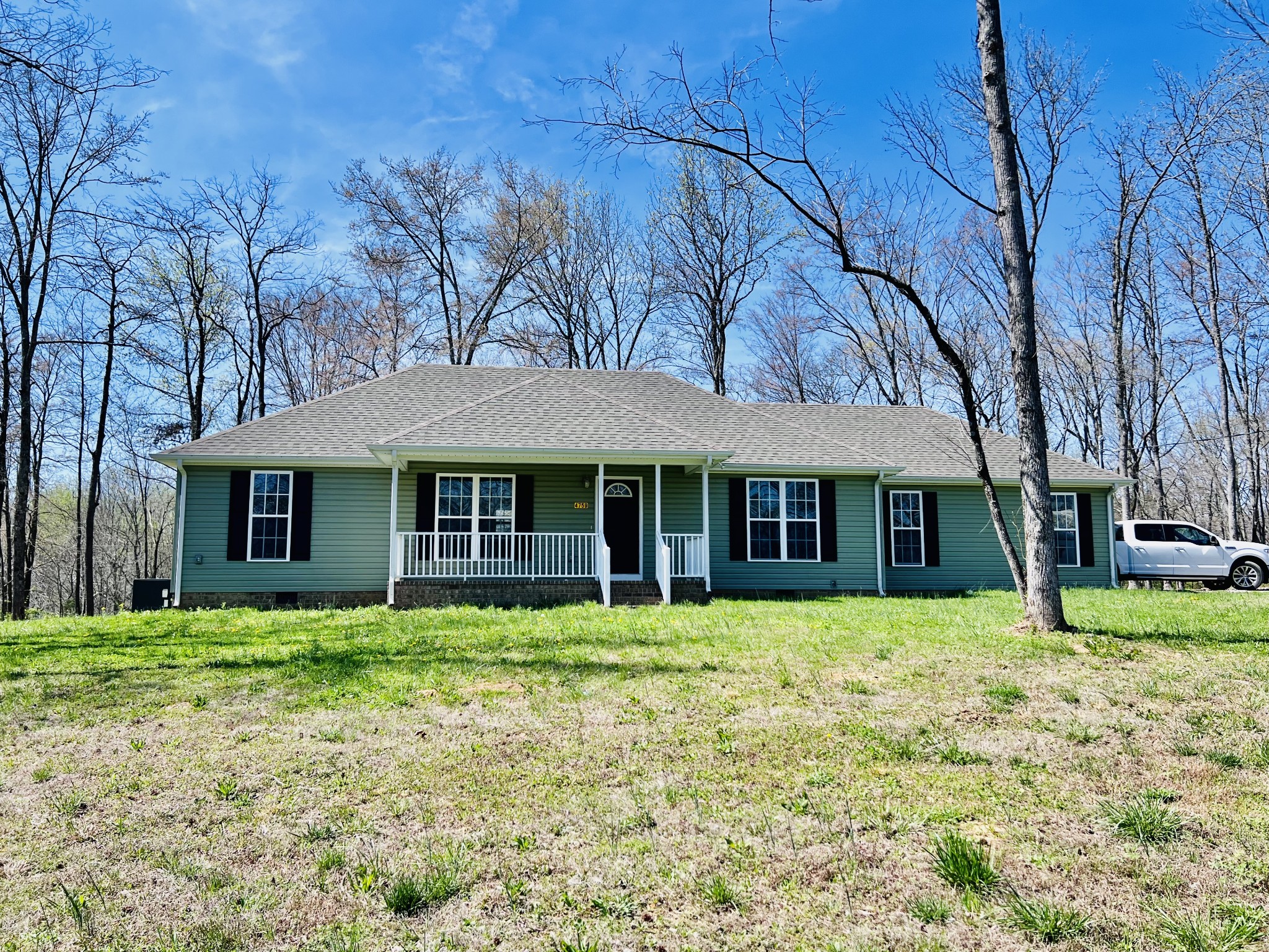 4759 Little Dry Creek Road Pulaski, TN 38478 - Photo 2 of 18 a house that has a big yard with large trees