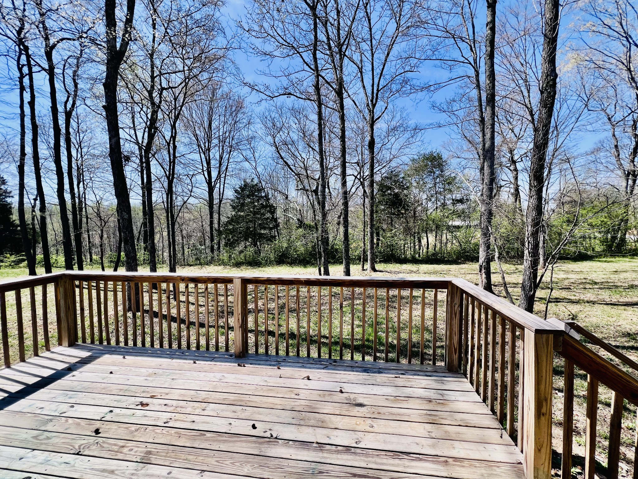 4759 Little Dry Creek Road Pulaski, TN 38478 - Photo 3 of 18 a view of balcony with wooden floor and fence