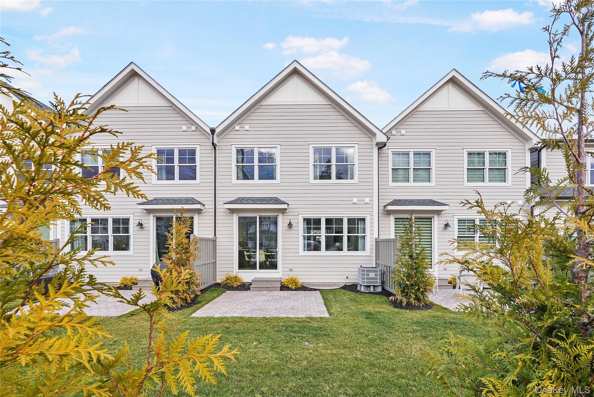 2040 Crompond Road, Unit 21 Yorktown Heights, NY 10598 - Photo 18 of 19 a front view of a house with a yard