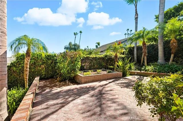 a swimming pool with outdoor seating and yard
