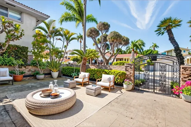 a outdoor living space with furniture and a potted plant