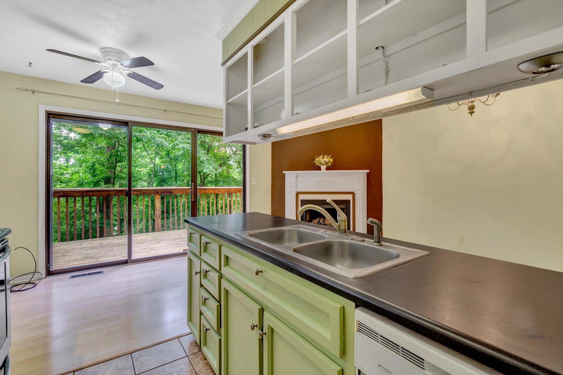 2910 Tree Swallow Road Roanoke, VA 24018 - Photo 14 of 36 a kitchen with a sink and a window